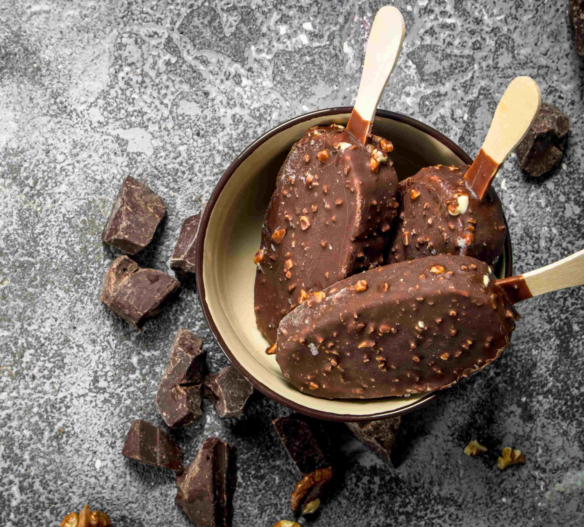 Bowl of Chocolate Covered Ice Cream Bars with Diced Almonds - Ice Cream Favorites