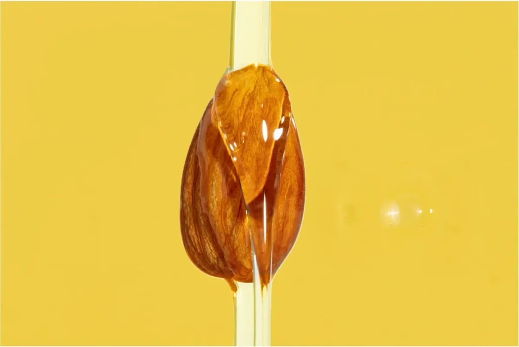Almond oil for industrial use: extraction methods, food vs. cosmetic grade, quality parameters, and sourcing specifications for food and personal care manufacturers.